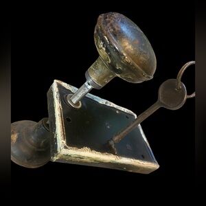 Antique metal/brass door knob with skeleton key and original hardware